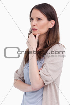 Close up side view of thoughtful woman