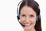 Close up of smiling female call center employee