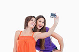 Two teenagers photographing themselves