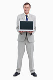 Smiling businessman presenting screen of his laptop