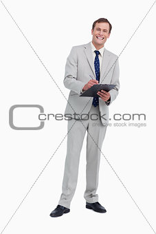 Smiling businessman ready to take notes