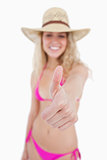 Thumbs up showed by an attractive smiling woman