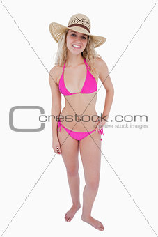 Young smiling woman wearing a hat