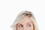 Eyes of a young blonde woman looking on the side