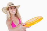 Frisbee held by an attractive woman