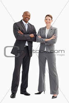 Smiling business man and woman posing