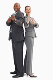 Smiling business people with thumbs up