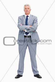 Portrait of a businessman with his arms folded 