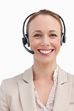 Portrait of a smiling businesswoman wearing a headset