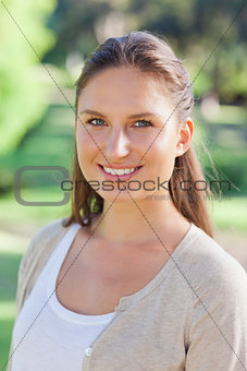 Close up of smiling woman in the park