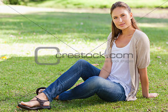 Woman sitting on the lawn