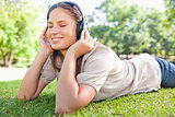 Woman enjoying music on the lawn