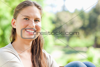 Smiling woman spending her day in the park