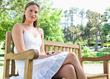 Female sitting on a park bench