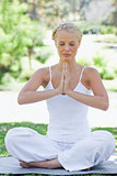 Relaxed woman in a yoga position