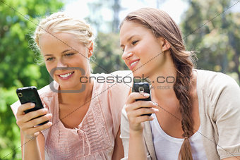 Friends with their cellphones