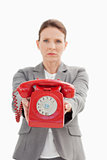 angry businesswoman holding a phone