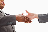 Businessman going  shaking a hand