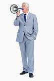 Businessman shouting with megaphone
