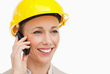 Woman wearing safety helmet on the phone