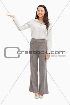 Portrait of an employee presenting with the hand