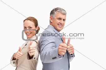 Portrait of business people approving back to back
