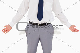 Man showing his empty pockets and hands