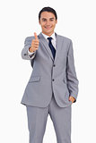 Smiling man in suit the thumb-up
