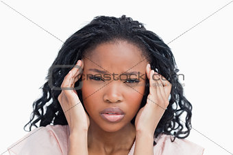 A young woman having migraine