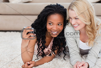 A woman is talking a picture of herself and her friend