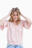 Frustrated woman with her hands in her hair