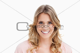 Smiling young woman looking at the camera