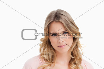 Serious young woman looking at the camera
