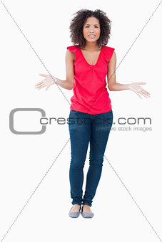 Young smiling woman wondering what happened
