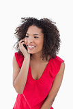 Happy brunette woman using her mobile phone