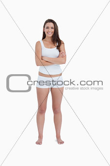 Smiling woman crossing her arms