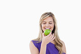 Smiling woman holding a delicious apple