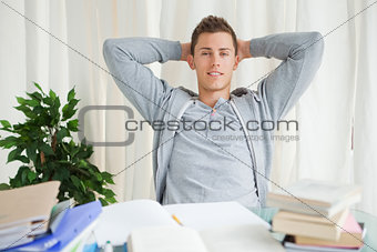 Portrait of a student stretching while looking away