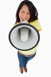 Close-up of a megaphone holding by a young woman