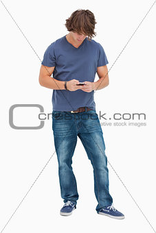Male student using his cellphone