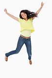 Smiling Latin student jumping
