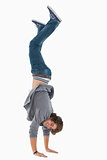 Male student posing handstands