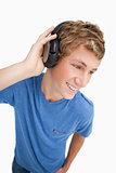 Fisheye view of a blond man wearing headphones