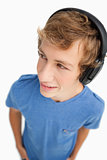 Fisheye view of a male student wearing headphones