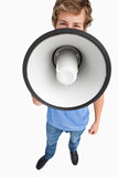 Fisheye view of a male student speaking in a megaphone