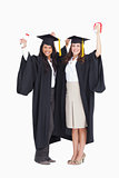 Two women celebrating their graduation