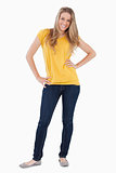 Young woman posing with a yellow shirt