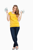 Beautiful blonde woman smiling with a lot of dollars