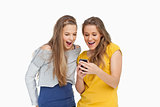 Two voiceless young women looking a smartphone