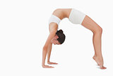 Slim woman in yoga position